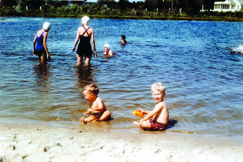 Families enjoy a summer outing on a beach formed along the shore of Silver Lake between Rehoboth Beach and Dewey Beach. COURTESY MARIE QUILLEN